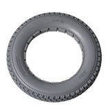 12-1/2x2-1/4 Light Gray Solid Urethane Mobility Tire with Knobby Tread, designed for durability and flat-free performance, showing detailed tread pattern suitable for indoor and outdoor use.