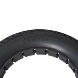 12-1/2x2-1/4 Dark Gray Solid Urethane Mobility Tire with Knobby Tread, featuring a durable, flat-free design suitable for various terrains.