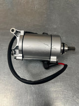 9 Tooth Starter Motor for 125cc/150cc, 250cc & 400cc ATVs, Dirt Bikes, & Go Karts (Blemished) - silver electric motor with black wire, cylindrical shape.