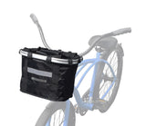 Lift Off Front Basket for Bikes & Scooters: A blue bicycle with a black AlveyTech front basket attached to the handlebar, featuring a quick-release mechanism and web hand strap for easy carrying.