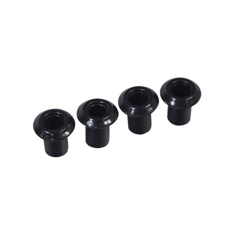 Plastic Bushings for the Razor Turbo Jetts Electric Heel Wheels (Set of 4) displayed in a row, showcasing their black plastic structure with visible holes in each bushing.