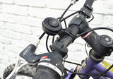 Close-up of the 120 dB Electric Bicycle Horn mounted on handlebars, showcasing its compact, weatherproof design with a visible USB charging port.