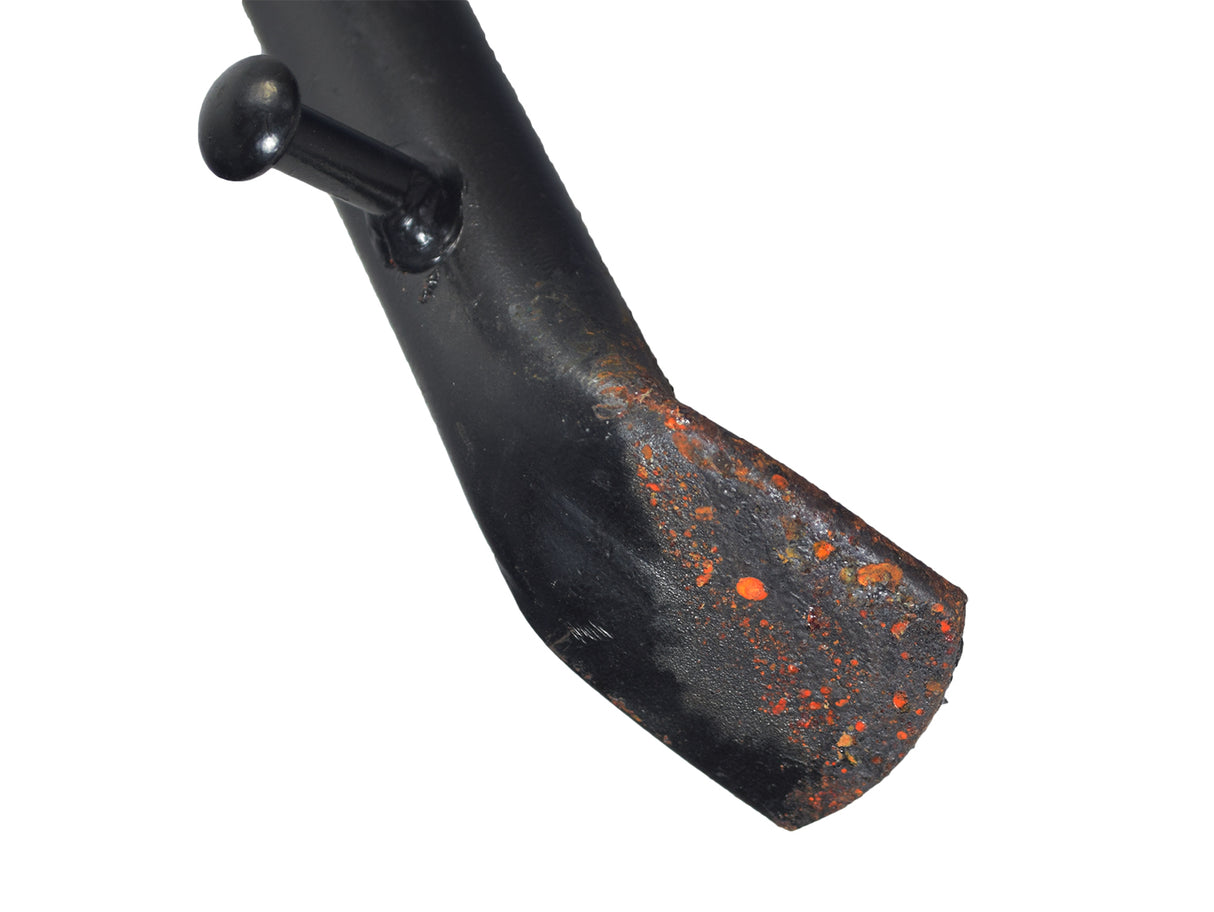 Kickstand for the Baja Mini Bike MB165 & MB200 models, showing a close-up of the black metal kickstand with a visible nail, highlighting its robust design and surface rust.