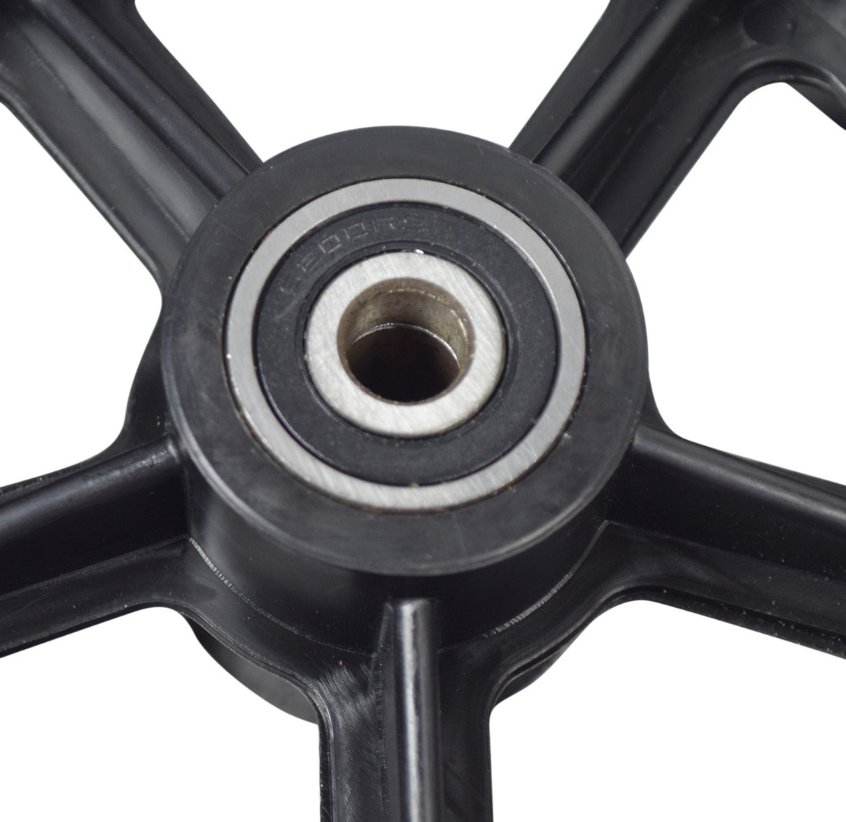 Rear Wheel Assembly for the Hover-1 Eagle, featuring a solid urethane tire and rim molded together, with pre-installed 6200RS bearings. Close-up of the wheel's central hole and structure.