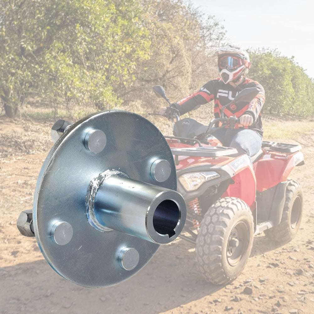 A person riding a quad bike outdoors, showcasing the 4 x 4 Go-Kart Live Axle Hub with 1 to 3/4 Step-Down, highlighting its robust design for off-road vehicles.