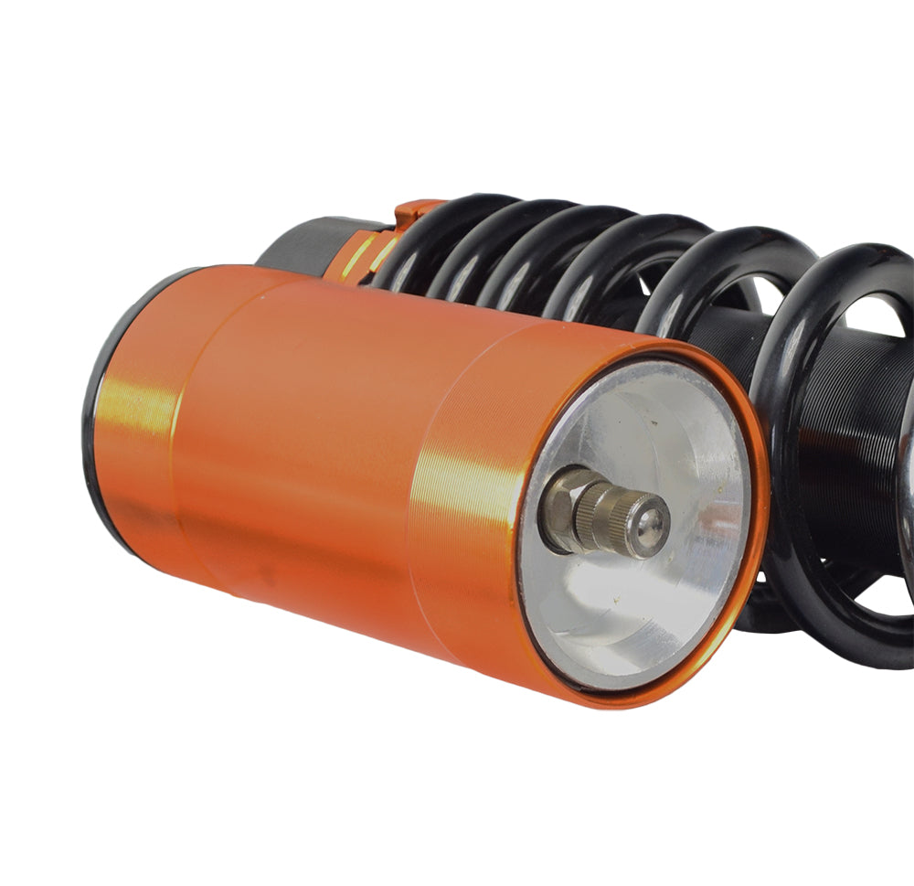 13-1/2 Adjustable Air Shocks for ATVs, Dirt Bikes & Go-Karts (Set of 2), featuring a close-up of black and orange steel and alloy springs and shock absorbers designed to enhance ride quality.