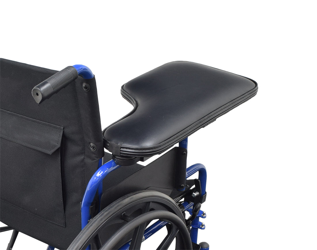 Universal Padded Black Vinyl Half-Lap Flip-Up Tray for Wheelchairs, shown mounted on a wheelchair's padded armrest. The tray is black with a convenient flip-up design and fits standard armrests.