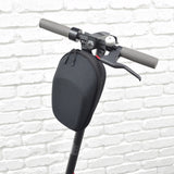 Front Handlebar Case for GOTRAX Electric Scooters mounted on a handlebar, showcasing its black, weatherproof design with a zipper and Velcro straps for secure attachment.