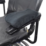 Black Memory Foam Curved Armrest Pads for Wheelchairs, Power Chairs, & Scooters (Set of 2) shown installed on a chair, featuring black velvet fabric and hook & loop straps for easy attachment.