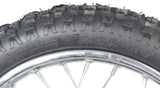 Close-up of a 14 front dirt bike wheel assembly with knobby tire, inner tube, and wheel bearings, suitable for many 50cc, 70cc, and 90cc Chinese dirt bikes.