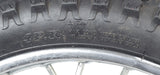 Close-up of the 14 (2.50-14) Front Wheel Assembly for Dirt Bikes, featuring the knobby tire, visible tread pattern, and detailed text on the tire.