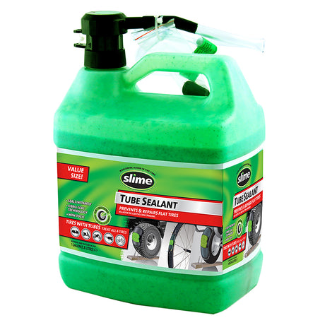 Slime Tube Sealant - 1 Gallon Jug, featuring a green plastic container with a black lid and nozzle, designed for easy application to prevent and repair punctures in tire tubes.