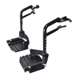 Hemi Footrests with Composite Footplates & Heel Loops for Invacare Insignia, Tracer EX2, and Tracer SX5 Wheelchairs (Set of 2) showing a pair of sturdy black metal foot pedals with heel loops.