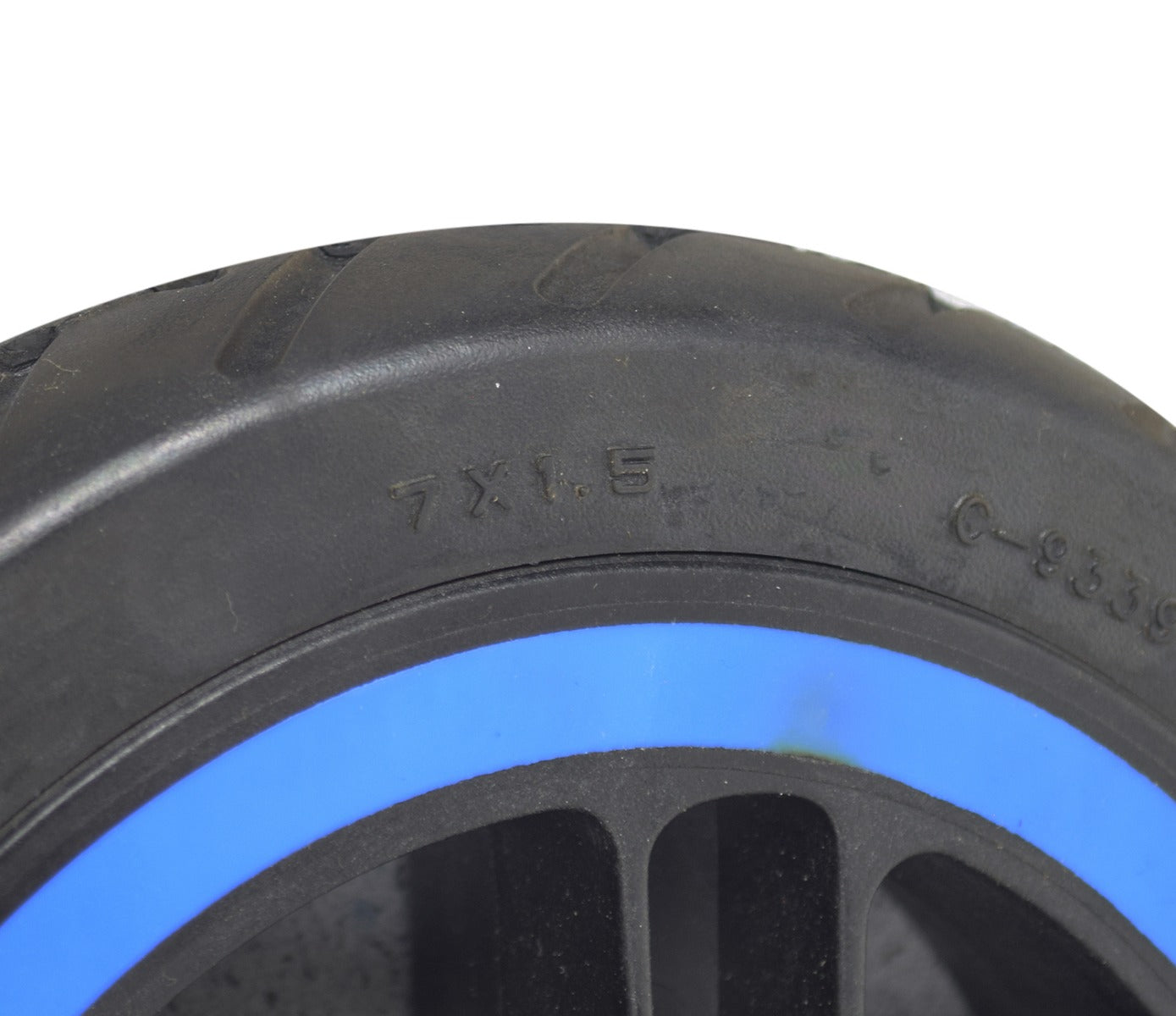 Front Wheel Assembly for the Ninebot ZING E10, showing a close-up of the solid 7 x 1.5 flat-free tire mounted on a 5-spoke black rim with blue trim and pre-installed bearings.