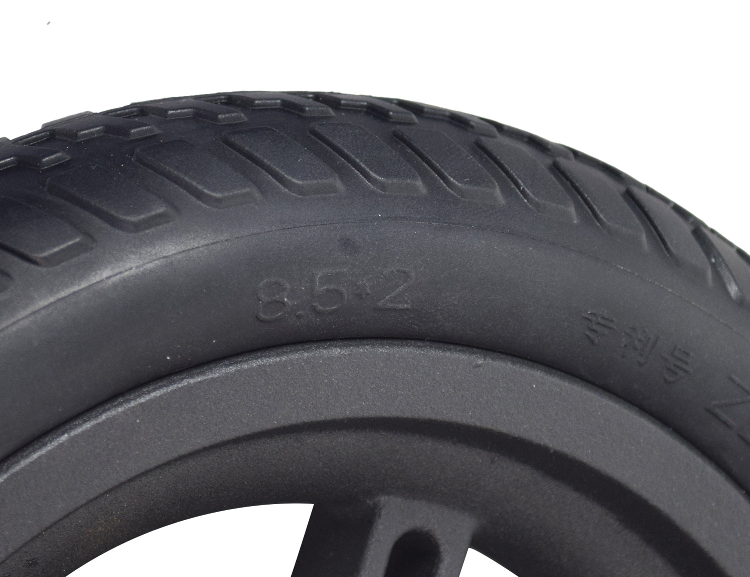 Close-up of the Rear Wheel Assembly for the Swagtron Swagger 5 Elite Folding Electric Scooter, showcasing the solid 8.5x2.0 tire on a cast metal, 6-spoke rim with visible brake disc mounting holes.