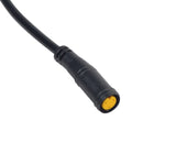 Dual Function Switch for Electric Bicycles featuring a black cable, yellow button, and a round 3-hole connector. Suitable for horns and lights, compatible with standard 7/8 handlebars and various electric bike models.