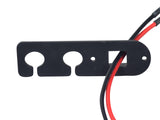 Minimoto Sport Racer 2-Wire Charger Port Assembly featuring close-up of a black and red cable with white circle detail on a black surface.