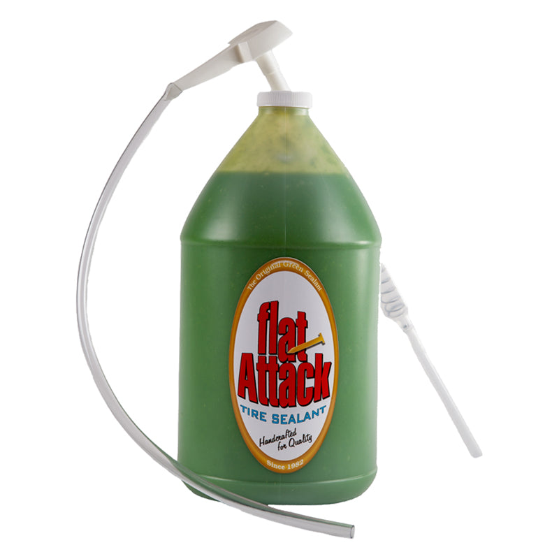 Flat Attack Tire Sealant - 1 Gallon Jug, a green liquid in a plastic jug designed for environmentally friendly tire sealing, visible with a white label.