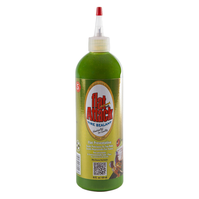 Flat Attack Tire Sealant - 16 oz Bottle: A bottle filled with green liquid, designed for eco-friendly tire maintenance, suitable for both tubed and tubeless tires, preventing plugged valves and oily residue.