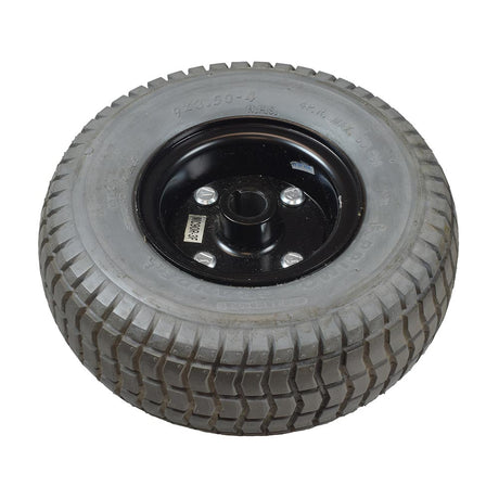 9x3.50-4 Foam Filled Drive Wheel Assembly for the Hoveround® MPV5® (Used) featuring a black rim and deep tread, suitable for replacement in gently used MPV5® power chairs.