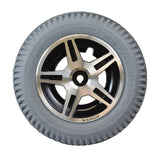 14x3 (3.00-8) Flat-Free Drive Wheel Assembly for Jazzy 614, 614HD, featuring a black tire with a silver star rim, ideal for replacing original wheel assemblies.