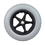 12-1/2x2-1/4 Foam-Filled Drive Wheel Assembly for the Merits Travel-Ease Commuter Heavy Duty (P181/P182/P183/P184) Power Chair, showing a black rim with sturdy treads and a hexagon-shaped screw.