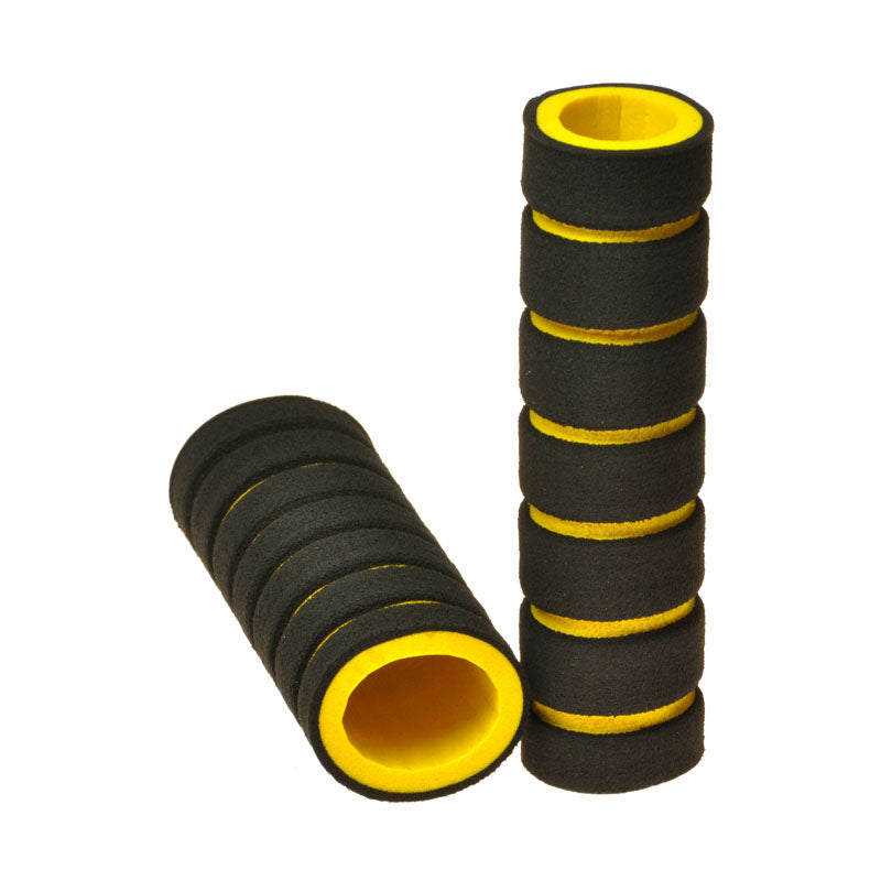 Stacked Foam Bike & Scooter Handlebar Grip Set showing two black and yellow grips. The image highlights their cylindrical shape and soft, spongy texture designed for comfortable rides.