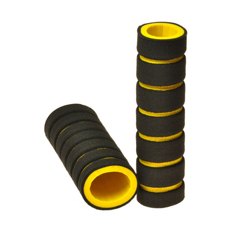 Stacked Foam Bike & Scooter Handlebar Grip Set showing two black and yellow grips. The image highlights their cylindrical shape and soft, spongy texture designed for comfortable rides.