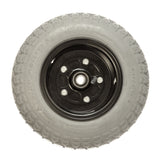 4.10/3.50-6 Front Foam-Filled Wheel Assembly for Pride Hurricane (PMV5001) featuring a black rim with a knobby tread tire mounted on a 5-point star rim, shown close-up.