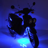 Multi-Color LED Light Kit for Street Scooters showing a scooter equipped with vibrant blue lights, highlighting its wheels and frame, ideal for a striking and customizable night-time visibility.