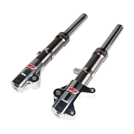 Front Forks for the Genuine Buddy 125 and Buddy 150, featuring metal cylinders and polished surfaces, showcasing detailed craftsmanship. Ideal for enhancing scooter performance and aesthetics.