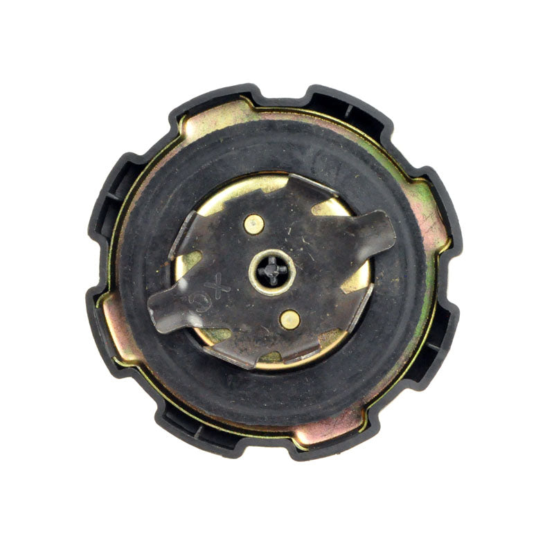 Fuel Cap for Motovox MGK10, MGK11, and MGK12 Go Karts, featuring a close-up view of the black and gold metallic circular object with intricate pipe details.