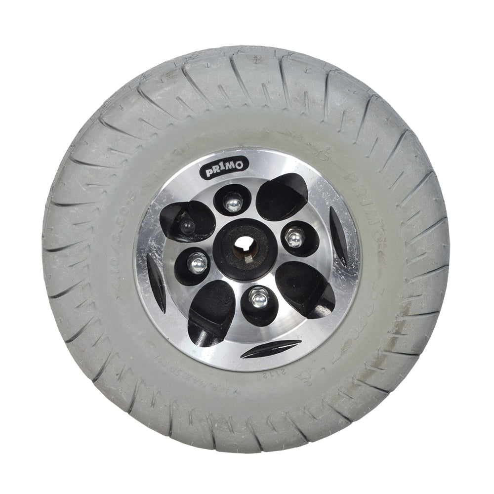 4.10x3.50-5 Drive Wheel Assembly for the Rascal 410 PC and 415 PC Power Chairs, featuring a close-up of the non-marking gray rubber tire, split rim design, and visible bolts.