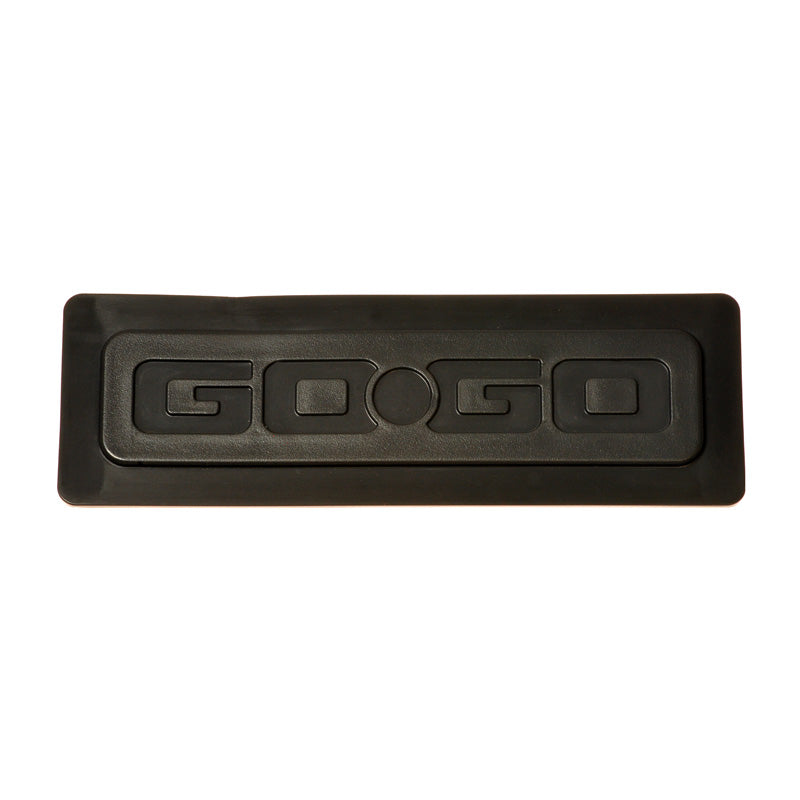 Floor Mat Insert with GO-GO Emblem for Go-Go Scooters, showing a close-up of a rectangular black rubber piece with text and a central square design.