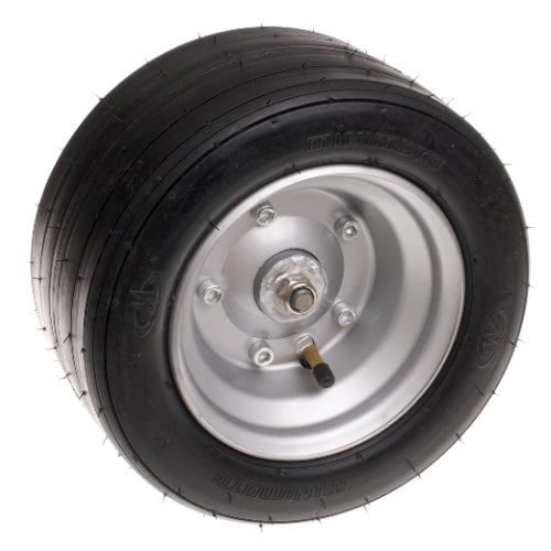 Honda Minimoto Go Kart Rear Wheel Assembly - Right Side, featuring a black tire with a silver rim, visible tread, and a close-up of the wheel and hubcap.