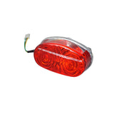 Taillight for the Baja Wilderness Trail 90 (WD90-U) 90cc ATV (VIN Prefix LUAH) featuring a red light with a silver rim and three wires visible at the back.