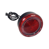 Taillight for the Razor Rambler 16 Electric Mini Bike, featuring a round 3-1/2 diameter red light with an attached wire, essential for visibility during low light conditions.