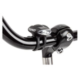 Close-up of the HL-L151 MicroGrip bicycle handlebar accessory, featuring an integrated light and lever. Ideal for various scooters and bikes, enhancing safety and functionality.