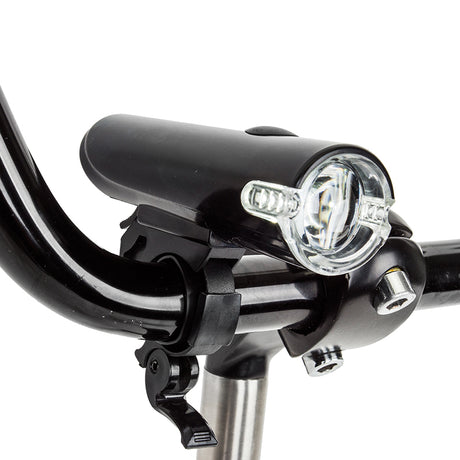 Close-up of the HL-L175 LED Headlight, a black bicycle light designed by Sunlite, showcasing its sleek metal and carbon construction.