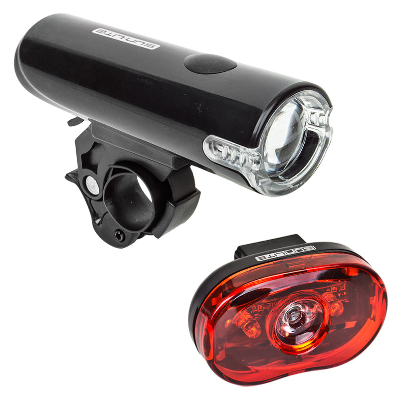 Close-up of the HL-L175/TL-L330 LED Headlight and Taillight Combo mounted on a black handlebar, showcasing its compact design and dual light functionality for enhanced bike safety.