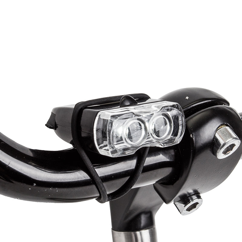 Close-up of the HL-L206 USB Headlight mounted on a bicycle, showcasing its sleek metal design and practical build.