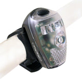 HL-L302 USB LED Headlight mounted on a white bicycle tube, showcasing a close-up view of the bike light's compact, sleek design. Ideal for scooters and bikes.