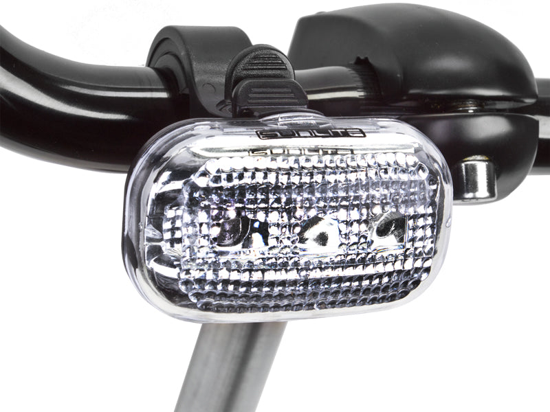 Close-up of the HL-L380 LED Headlight for bicycles and scooters, showcasing its clear, bright light.