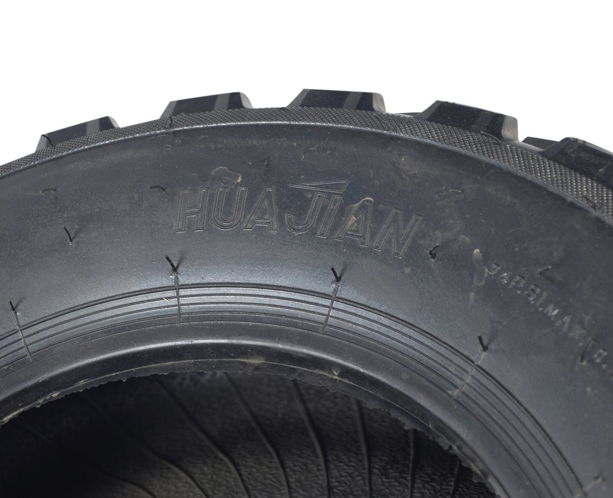 Close-up of the 21x7.00-10 (175/70-10) ATV & Go-Kart Tire showcasing its knobby tread, ideal for Baja ATVs and go-karts, featuring mud-clawing sipes for excellent all-around performance.