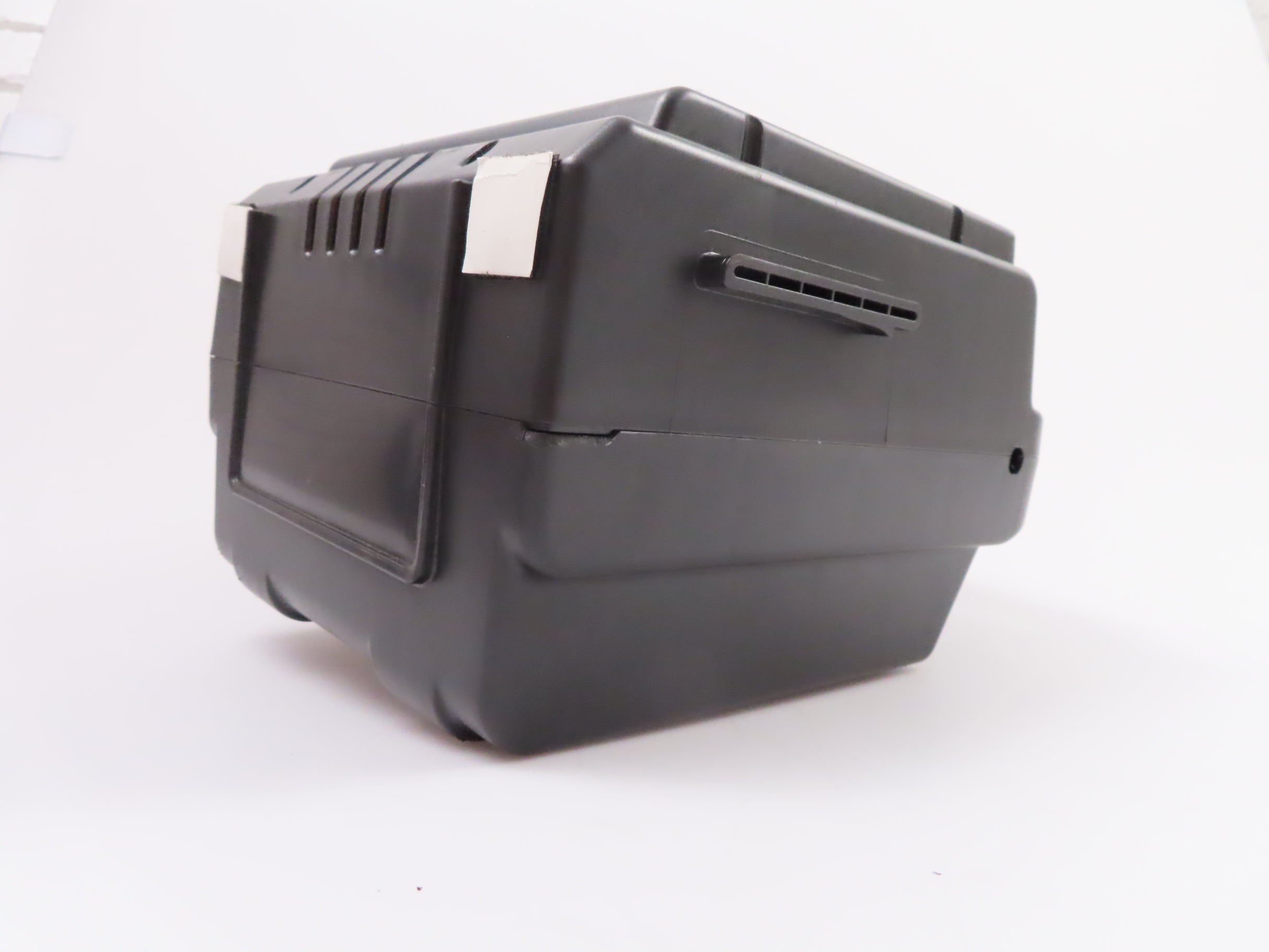 Battery Box without Batteries for the Golden Technologies LiteRider & LiteRider PTC (Blemished) showing a black plastic box with a white label, highlighting its minor cosmetic chip.