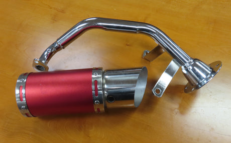 Red Short Performance Exhaust System for GY6 150cc Scooters & Go-Karts, showing a red muffler and chrome exhaust pipe on a wood surface, missing gasket, mounting hardware, and clamp.