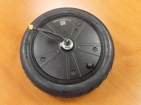 250 Watt Hub Motor & Front Wheel Assembly for GOTRAX GXL V2 & XR Elite Electric Scooters (Blemished) showing a black wheel with an attached cable, featuring a 50/75-6.1 pneumatic tire with directional street tread.