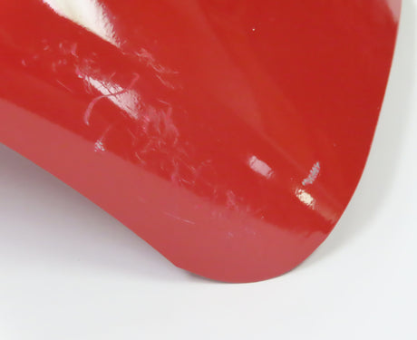 Red Rear Fender for the Coleman CT200U Trail (Blemished) showing visible scratches and white spots on a red surface.