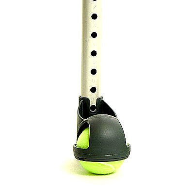 Invacare Court-Side Glide: Close-up of a tennis ball mounted on a white pole, designed for easy attachment to walkers, featuring built-in leg extensions and spring-loaded brakes for enhanced mobility and safety.