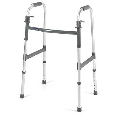 Invacare Dual Release Adult Paddle Walker featuring a grey and silver lightweight metal frame, ergonomic release paddles, and lower side brace for enhanced stability. Suitable for users 5'3 to 6'4, 300 lb. capacity.